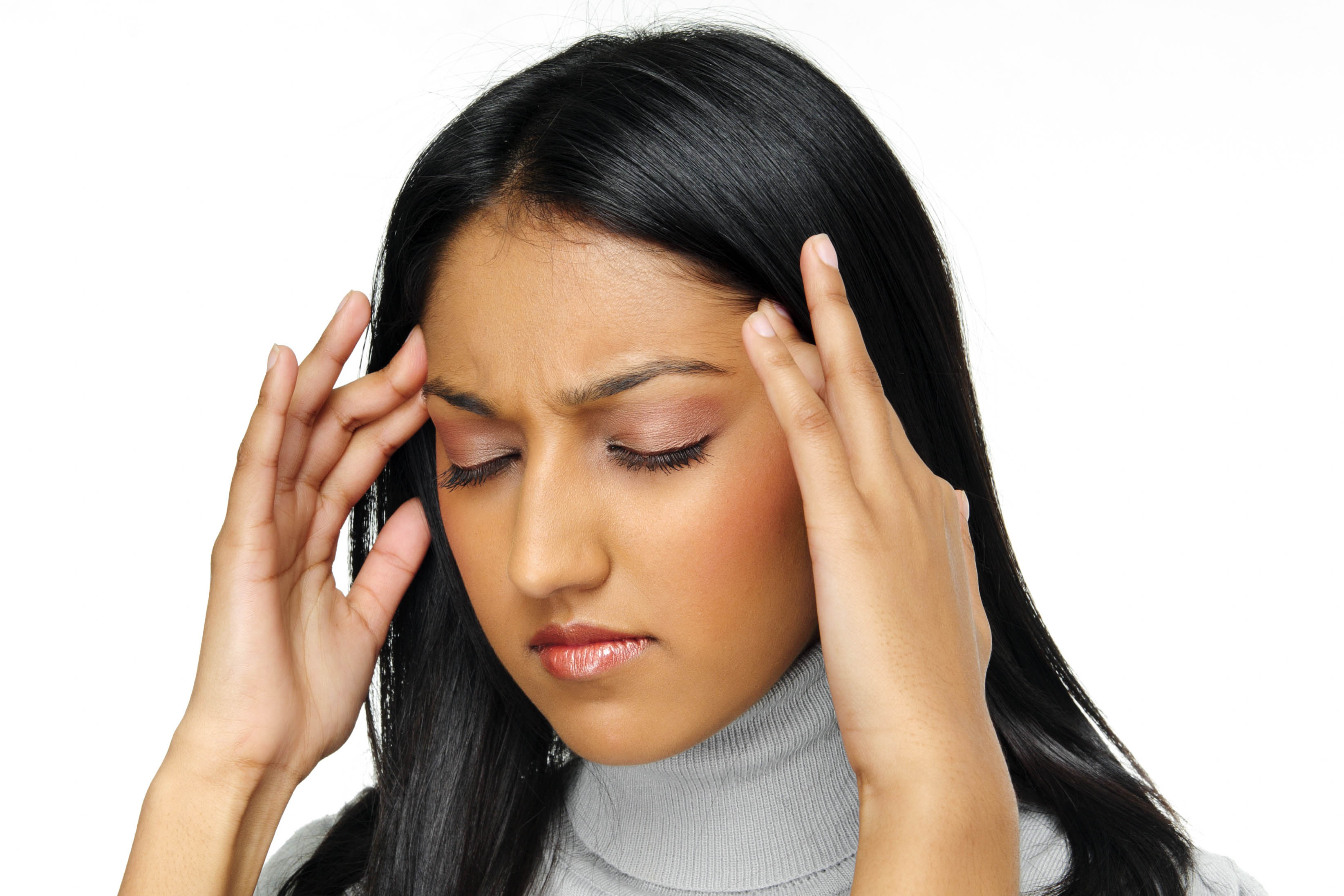 Indian beauty has a headache caused by stress